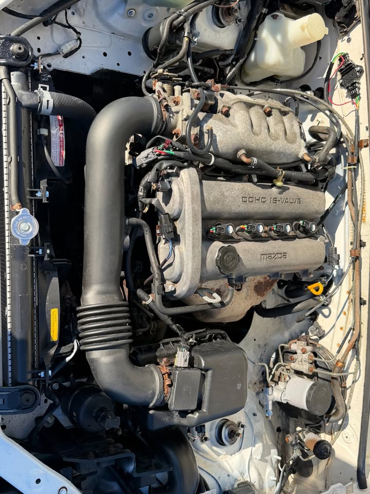 2000 Mazda Miata, manual, tan soft top, no A/C, photo 10