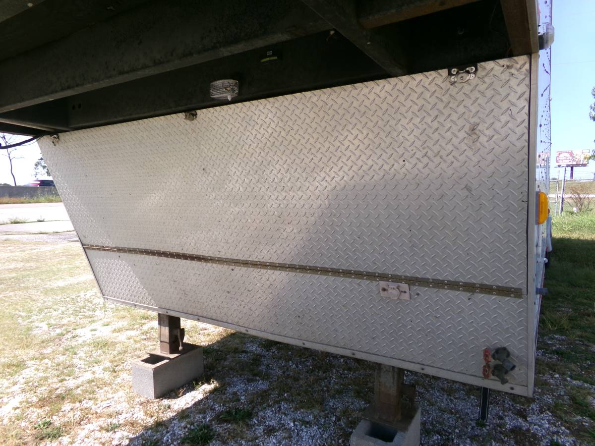 Trailer 40 ft.& 8 ft. wide GooseNeck. 1997 Trailer has a big side door, photo 6