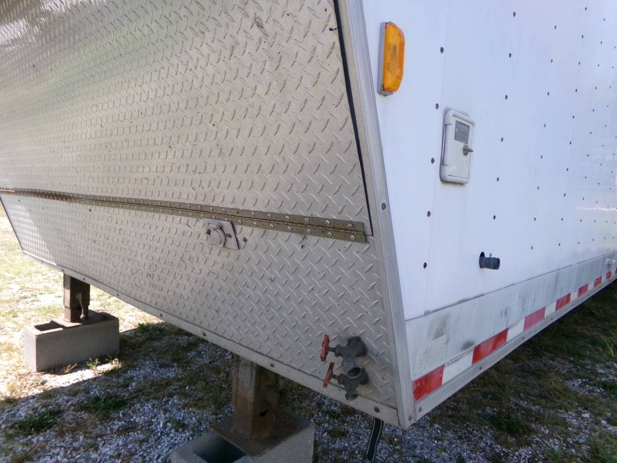 Trailer 40 ft.& 8 ft. wide GooseNeck. 1997 Trailer has a big side door, photo 7