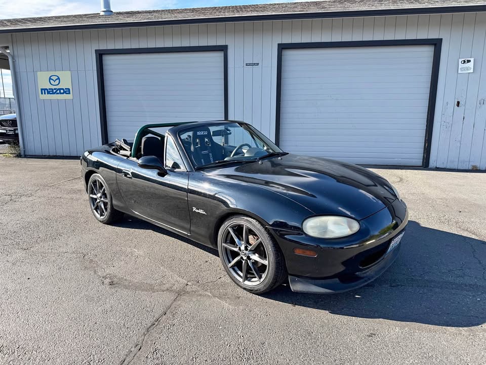 1999 Mazda MX-5 Miata NB, 5-speed manual swap, roll bar